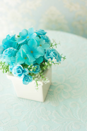 flower pots on vintage tableの写真素材