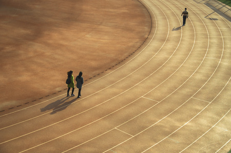 three people doing morning exercisesのeditorial素材