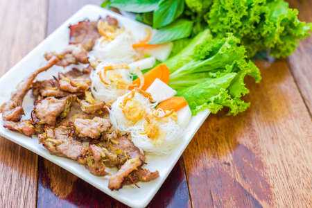 Fried pork and vegetable salad - soft focusの写真素材