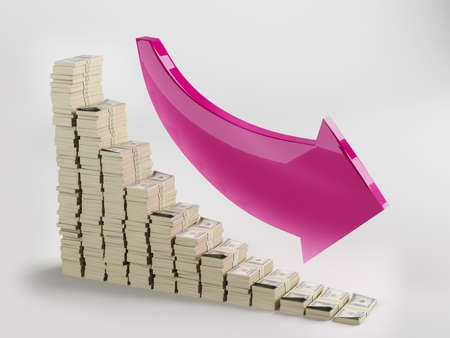Red arrow shows the drop in profits in the form of money stacksの写真素材