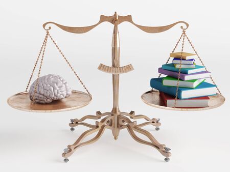 On one side of the scale brain to another bookの写真素材