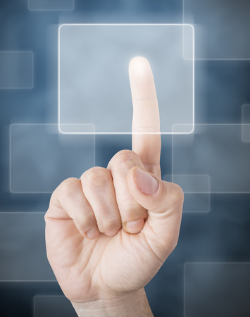 Picture of a finger pointing on a transparent device.

の写真素材