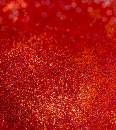 Picture of a red background with sparkling glitterの写真素材