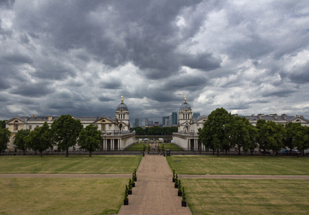 View of a pathway down to the Old Royal Naval College from Greenwich Park, London England on a stormy day.のeditorial素材