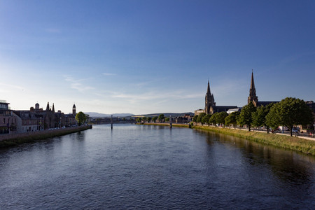 Early sunset view of Inverness, Greig Street Bridge and the River Ness in the Scottish Highlands.の写真素材