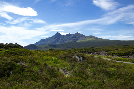 Trail and peak at Tir Nan Iolaire or Land of Eagles and the Cuillin on the Isle of Skye in Scotland.の写真素材