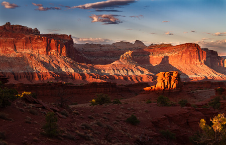 Glorious sunset on the rock formations of Capitol Reef National Park in Utah , USA.の写真素材