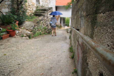 steep street in provincial town of Dalmatiaの写真素材