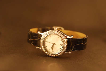 Photo of a watch decorated with gemstones.の写真素材