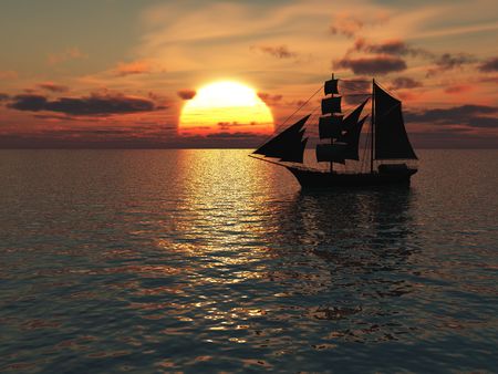 An old merchant ship out at sea at sunset.の写真素材