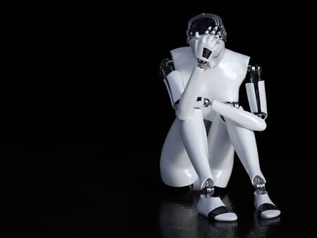A female robot sitting in solitude on the floor and looking sad or depressedの写真素材