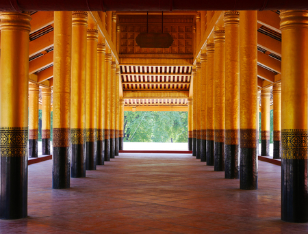 MANDALAY/MYANMAR - DECEMBER 15, 2014: Beautiful ancient golden poles at Mandalay Palace, Myanmarのeditorial素材