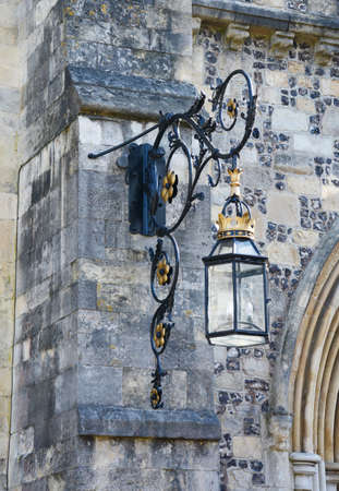 An ornate lantern on the stone exterior of the Great Hall in Winchester, Englandの写真素材