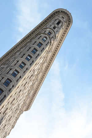 NEW YORK - OCTOBER 22, 2017: The Flatiron Building at 175 Fifth Avenue in Manhattan rises up into a...