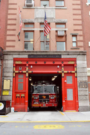 NEW YORK, USA - MAY 10, 2019: Exterior of FDNY Squad 18 building at 132 West 10th Street on May 10, 2019. The New York Fire Department fire truck stands ready for service.のeditorial素材