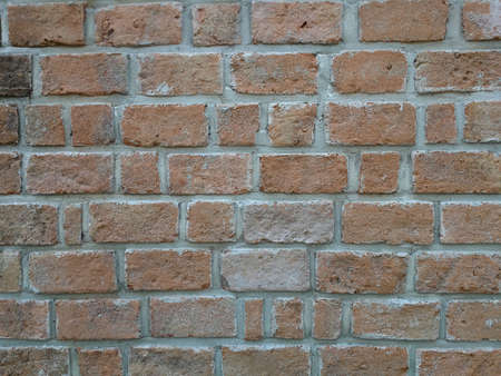 Brown brick wall texture.  Full frame of brick wall background.  Floor tiles.