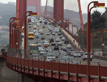 SAN FRANCISCO, CA USA â SEPTEMBER 10 - Golden Gate bridge with cars, trucks, buses, pedestrians and cyclists at 3 30 pm on September 10,2013 のeditorial素材