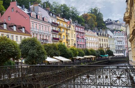 Karlovy Vary, Czech Republic - September 20, 2016: street with historical buildings,Tepla river and bridge.のeditorial素材