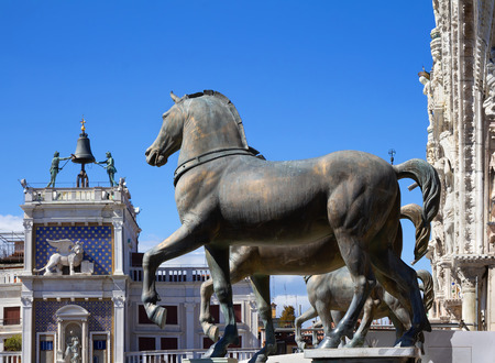 Horses of Saint Mark (Triumphal Quadriga) with Clock Tower in background. Venice, Italy.の写真素材