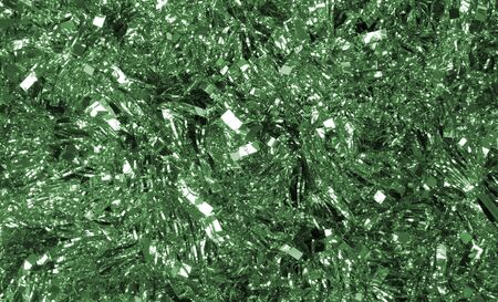 background texture of sparkling green Christmas tinselの写真素材