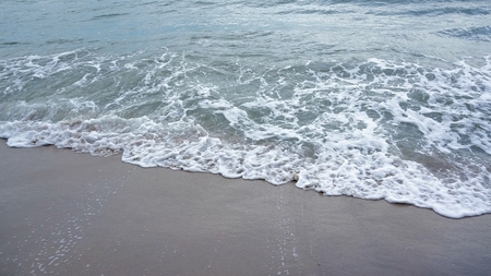 a wave at the beachの写真素材