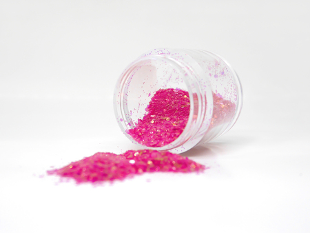 Sparkling glitter for nail art on white backgroundの写真素材