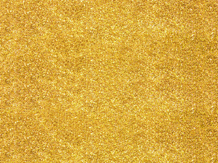 Blurred gold glitter backgroundの写真素材