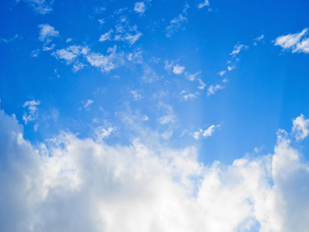 Blue skies and clouds background