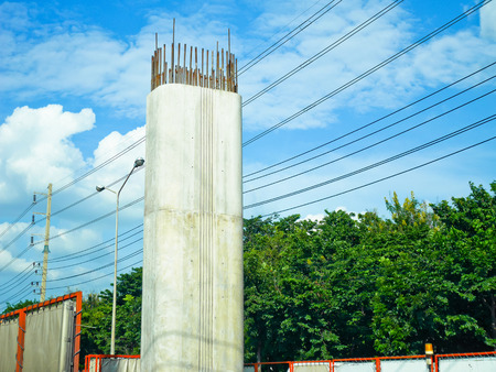 Concrete reinforcement of pillars in construction siteの写真素材