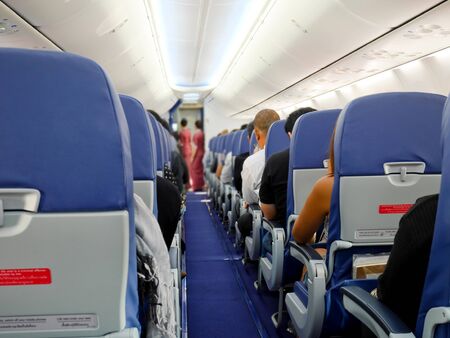passengers and stewardesses on the plane