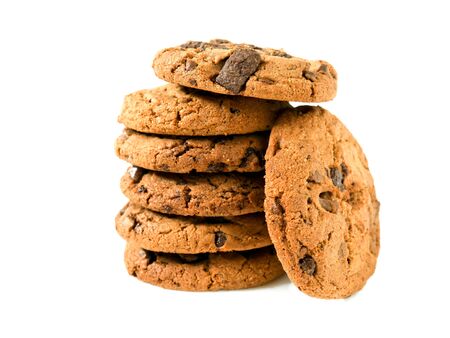 Stack of chocolate chip cookies isolated on white backgroundの写真素材