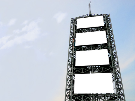 Blank advertising billboard on blue sky backgroundの写真素材
