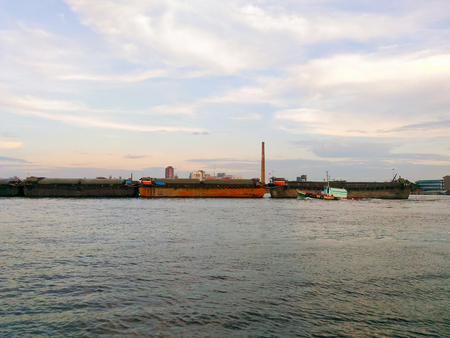 Barges on the river in eveningの写真素材