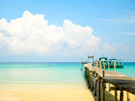 Wooden jetty and crystal clear water in Koh Kood Island, Thailandの写真素材