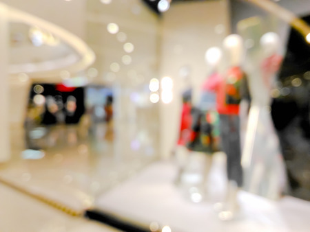 Blurred mannequins in a clothing shopの写真素材