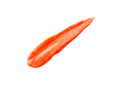 Shimmering lip gloss isolated on white backgroundの写真素材