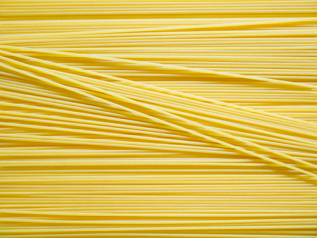 Dried capellini spaghetti pattern background
