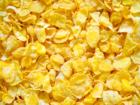Cornflakes breakfast cereal background. Top view. Healthy breakfast concept.