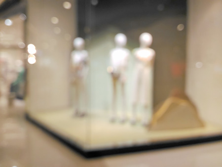 Blurred mannequins in a clothing shop in shopping mallの写真素材