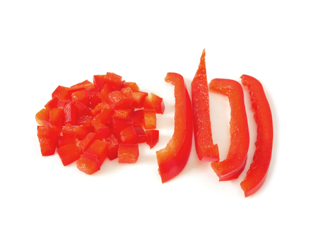Red sliced bell peppers or sweet peppers or capsicums isolated on white backgroundの写真素材