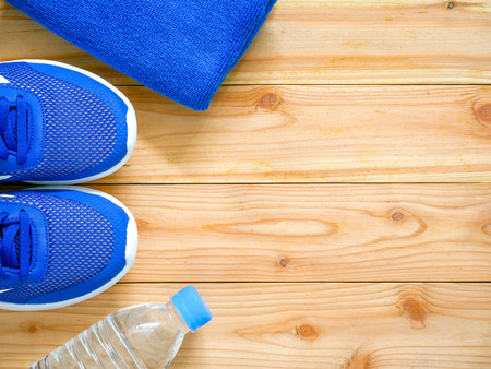 Exercise and fitness equipment on wooden  in the gym with copy space. Top view.の写真素材