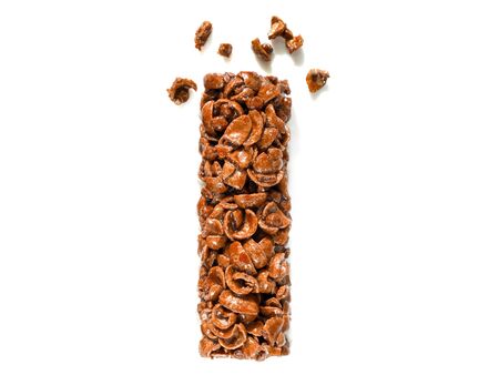 Chocolate Breakfast Cereal Bar with crumbs isolated on white