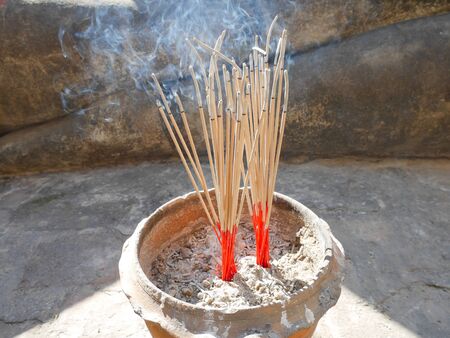Incense sticks or joss sticks in the templeの写真素材