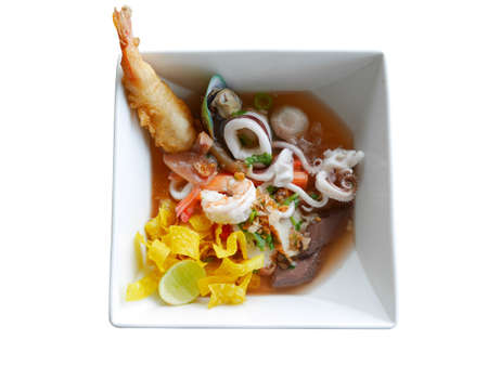 Seafood noodle soup or yen ta fo isolated on white background  . Thai food.の写真素材