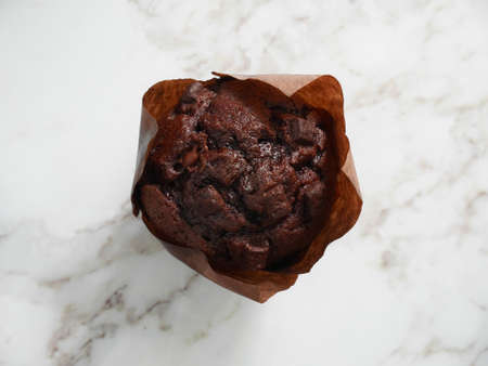 Chocolate muffin on the table. Top view.の写真素材