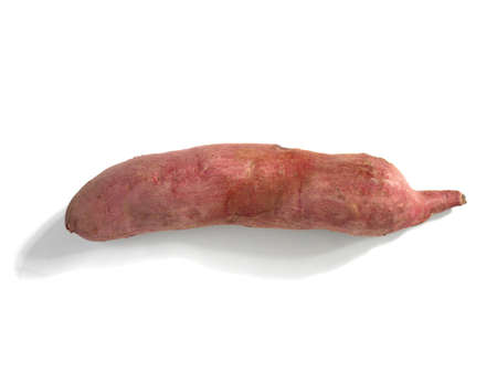 Fresh purple sweet potatoes isolated on white backgroundの写真素材