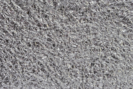 silver aluminum foil backgroundの写真素材