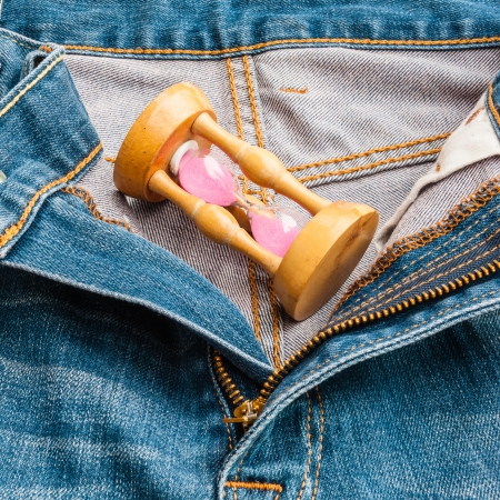 Blue denim jeans with Hourglass , backgroundの写真素材