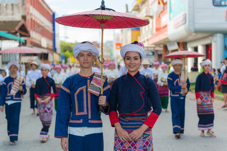 Lamphun,Thailand-June,25,2014 : Unidentified man and woman in the celebrations, "Longan Thailand restore happiness to the people 2014" Lamphun,Thailand-June,25,2014 . Thailand is organized to create love and harmony  after the military coup.のeditorial素材