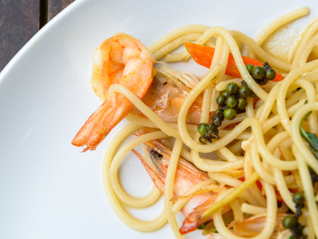 Spaghetti seafood in white dishの写真素材